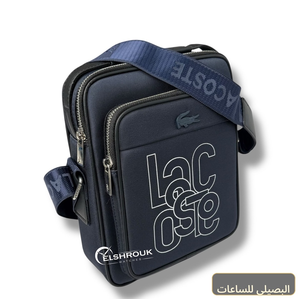 شنطة كروس لاكوست رجالي باللون الأزرق بتصميم مستطيل عملي